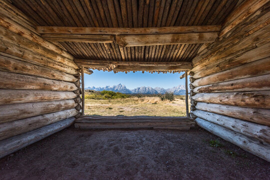 Looking through an old barn at the Teton mountain range
