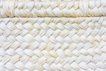 Close-up of a woven basket, light beige/white