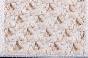 Close-up of a cream-colored woven fabric