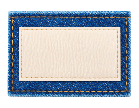 A blue denim fabric patch with a beige rectangular fabric label sewn in the center using yellow thread stitching.