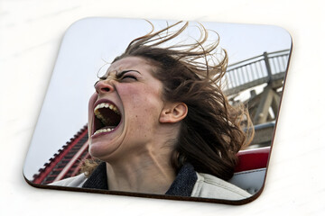 Roller Coaster Scream: A woman experiences sheer exhilaration and terror as she rides a thrilling roller coaster, her face contorted in a scream of delight. Capturing raw emotion.