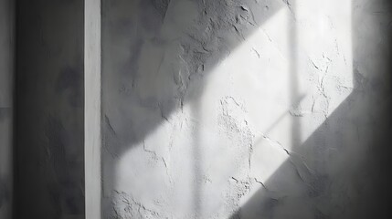 Photograph of textured wall with strong, linear shadows cast by sunlight.