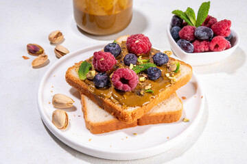 Summer breakfast delicious sandwiches with pistachio butter spread