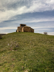 Stone bell tower of San Martin Church in Rabanal de los Caballeros countryside