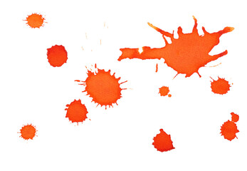 Vibrant orange watercolor paint splatters on white background create an artistic and dynamic composition