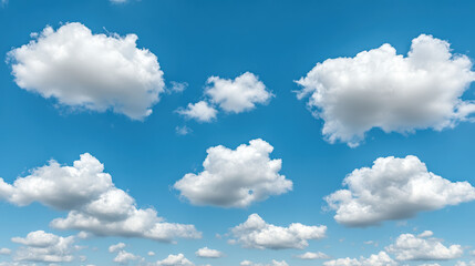 Fototapeta premium Fluffy white clouds drift across clear blue sky, creating serene and peaceful atmosphere