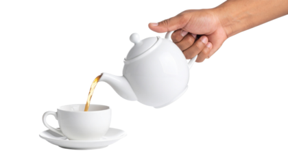 Elegant hand pouring tea from teapot into cup, mid-motion freeze, isolated on transparent background
