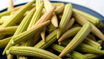 Fresh and Delicious Baby Corn Displayed on a Plate Ready to be Cooked