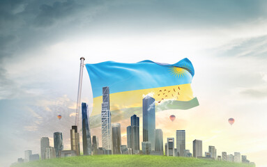Rwanda national flag wavering with modern building skyline. Country showing stronger and...