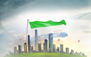 Sierra Leone national flag wavering with modern building skyline. Country showing stronger and...