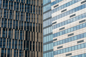 Fototapeta premium walls and windows of high business building bottom view