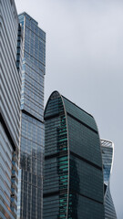 Obraz premium walls and windows of high business building bottom view