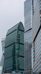Obraz premium walls and windows of high business building bottom view