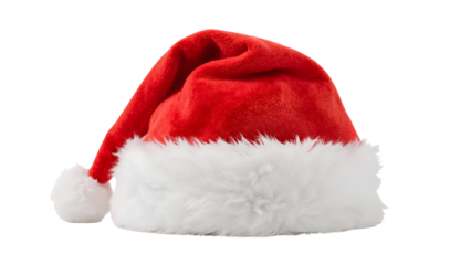 Red santa hat with fluffy white trim on isolated background  festive holiday symbol