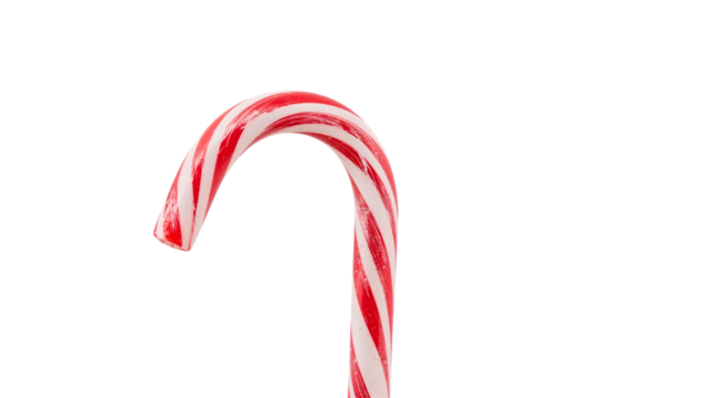 Festive red and white candy cane isolated on isolated background for holiday season themes