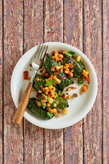 swiss chard rolls rolled with parsnips, butternut squash, potato, and bacon