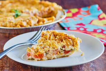 tomato pie made with a parmesan cream sauce