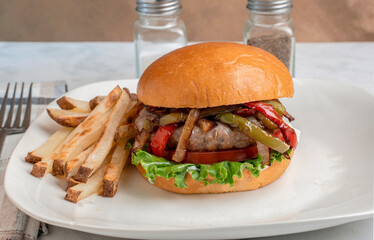 sausage burger  top with peppers and onions