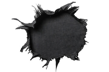 Close up of a ripped black fabric hole with frayed edges isolated on transparent background