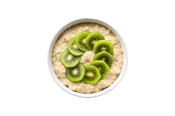 Morning porridge bowl featuring sliced kiwi fruit arranged in overlapping pattern on oat base, isolated on a transparent background
