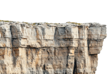 Rugged limestone cliff face with stratified layers and sparse vegetation isolated on transparent background