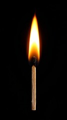 A single lit matchstick against black