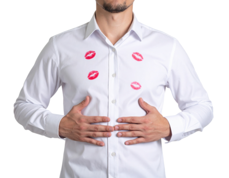 A man wearing a white button-up shirt with red lipstick kiss marks on the chest, holding his stomach with both hands. - Powered by Adobe