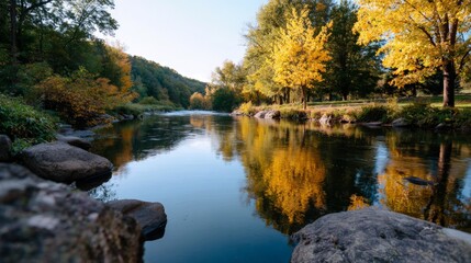 Serene autumn river with vibrant foliage and reflections in a tranquil forest landscape