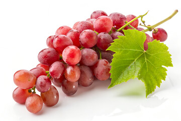 Obraz premium Bunch of Juicy Red Grapes with Fresh Green Leaf on White Background