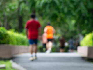 Blurred Runner, Jogger in Public Park, Active Lifestyle Background