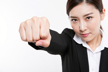 Young beautiful business woman with fist raised