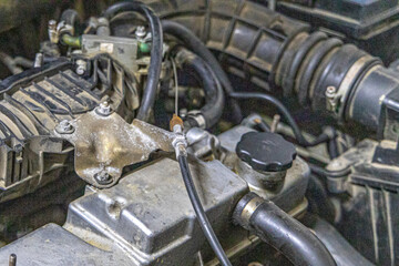 Closeup photo shoot of different nesessary tools and parts in every man's garage.Auto check up and car service shop concept.Different type of tools, especially wrenches.car engine repair.