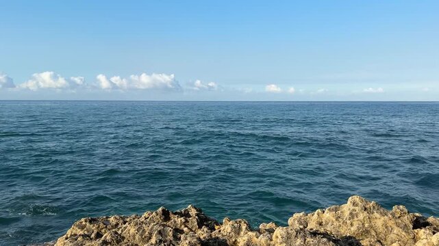 Sea, rocks and blue sky.