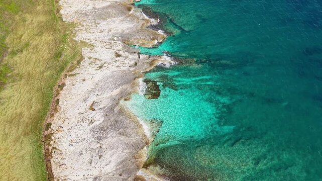 Aerial view of a beautiful rocky coastline in Kape Kamenjak, Istria, Croatia 