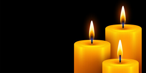 3 Burning candles. Yellow candle with golden flame on dark background.