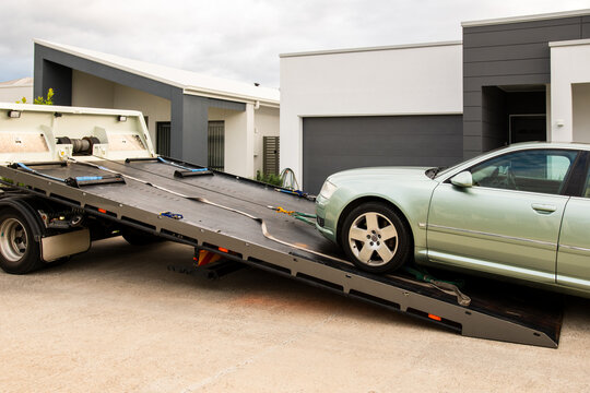car being put on a tow truck