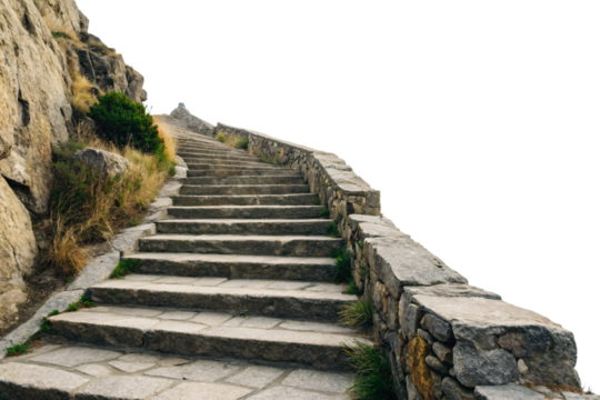 Rustic stone steps winding up rocky terrain with golden dried grass and green moss patches growing, isolated on a transparent background