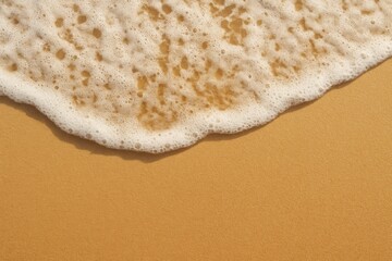 Golden Sand and Foamy Waves A Coastal Texture