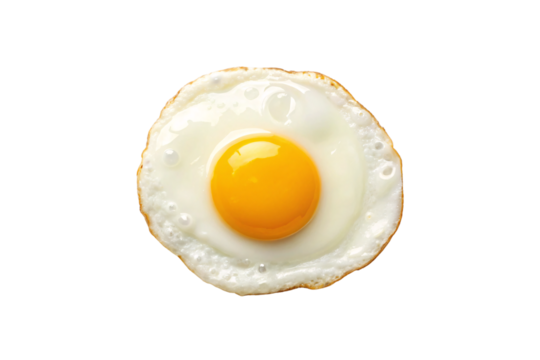 Perfectly cooked fried egg with golden yolk and crispy white edges showing bubbles, isolated on a transparent background