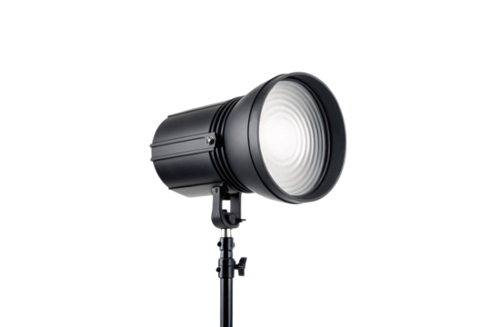 Professional black photography studio light with fresnel lens on adjustable stand, isolated on a transparent background