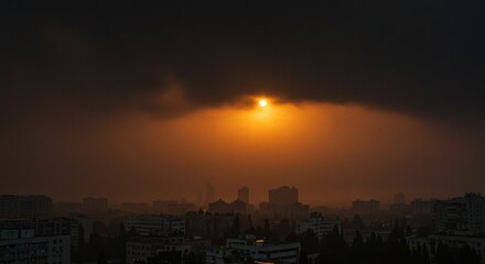 Smoky Sunset Over City Skyline