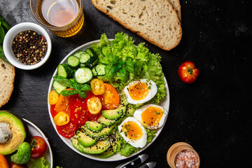 Healthy Salad Bowl with Avocado, Eggs, Tomatoes and Cucumbers,	