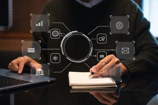 Man using futuristic interface with smart tech and mobile to manage ESG, clean energy, and sustainability data.