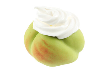 a close up of a peach with whipped cream on top