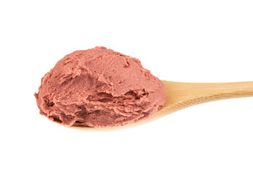 a spoon with a scoop of ice cream on it