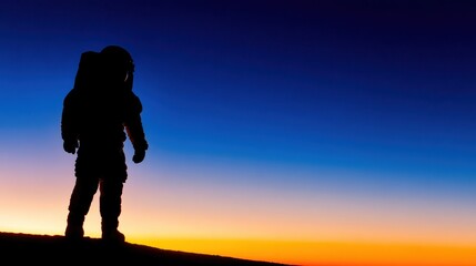 Astronaut silhouette against a vibrant sunset horizon, symbolizing exploration and adventure