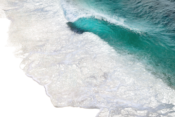 Aerial view of a tropical beach with black sand and turquoise ocean waves