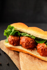 Meatball sandwich fast food meat dish fresh delicious gourmet food background on the table rustic food top view copy space