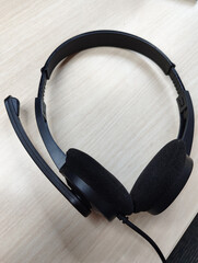 headphones on the wooden table