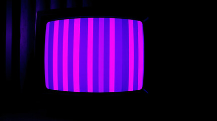 Vintage television screen displaying colorful test pattern bars.